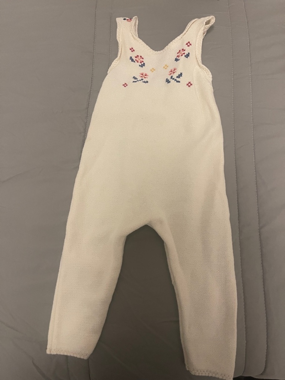 Zara cream knit romper with small floral embroidery